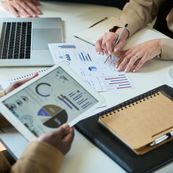 Developer at desk with floating tech icons